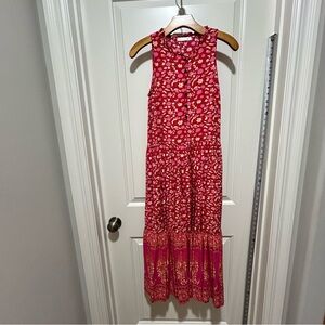RiVioimos brand size 4/6 or small women’s. Floral Sleeveless Red white dress